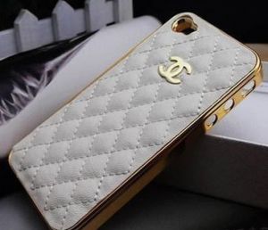 Chanel gold white quilted mobile phone.jpg